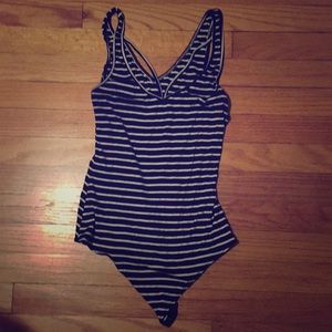 Stripped body suit